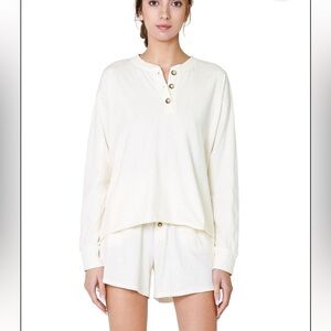 DONNI. Ribbed Henley Long Sleeve Tee in Cream